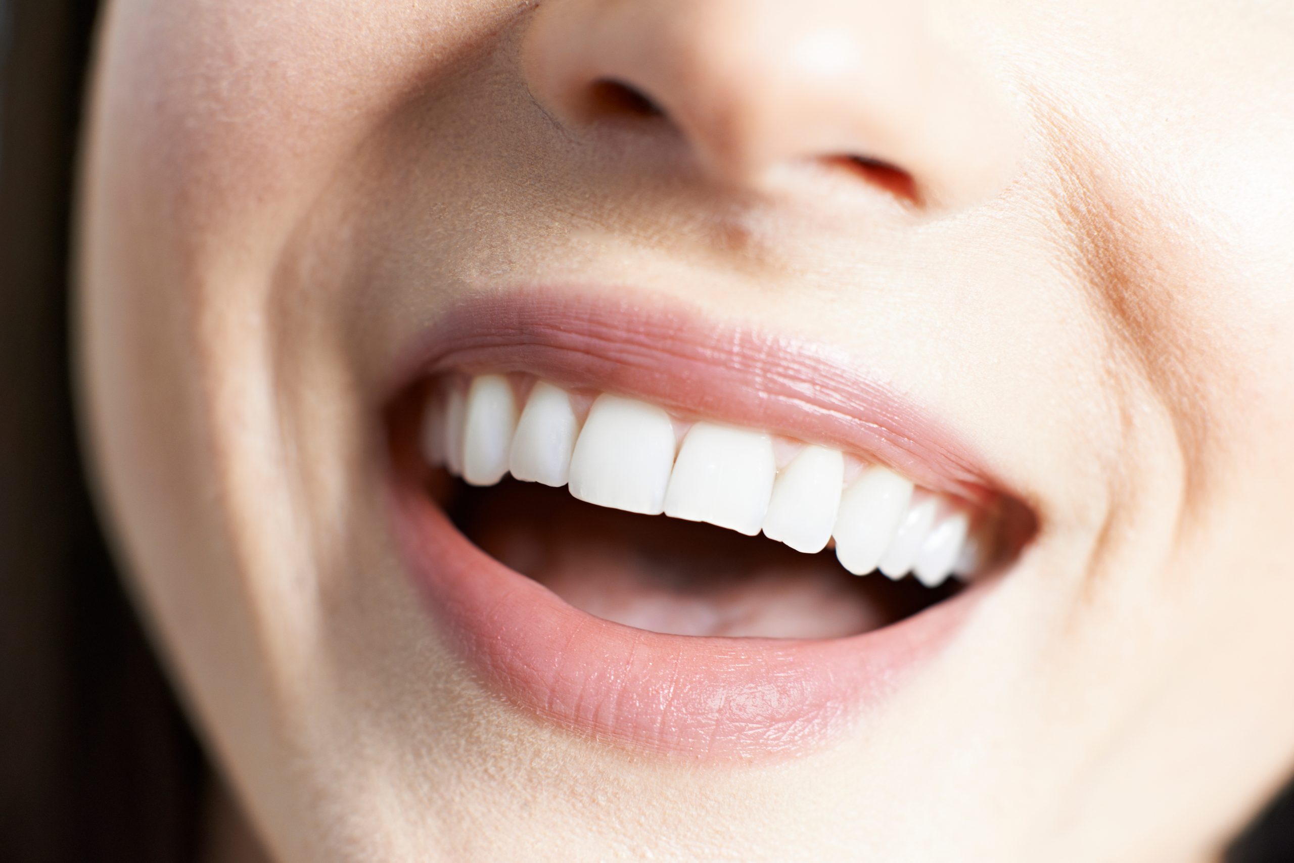 Close Up Of Woman With Beautiful Teeth And A Perfect Smile
